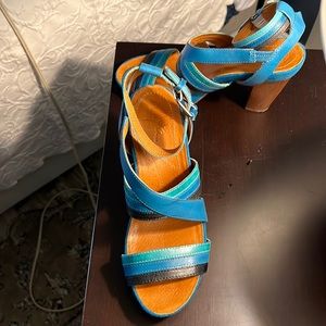 Never worn, rubber, bottom, leather, upper teal, royal and black stripe